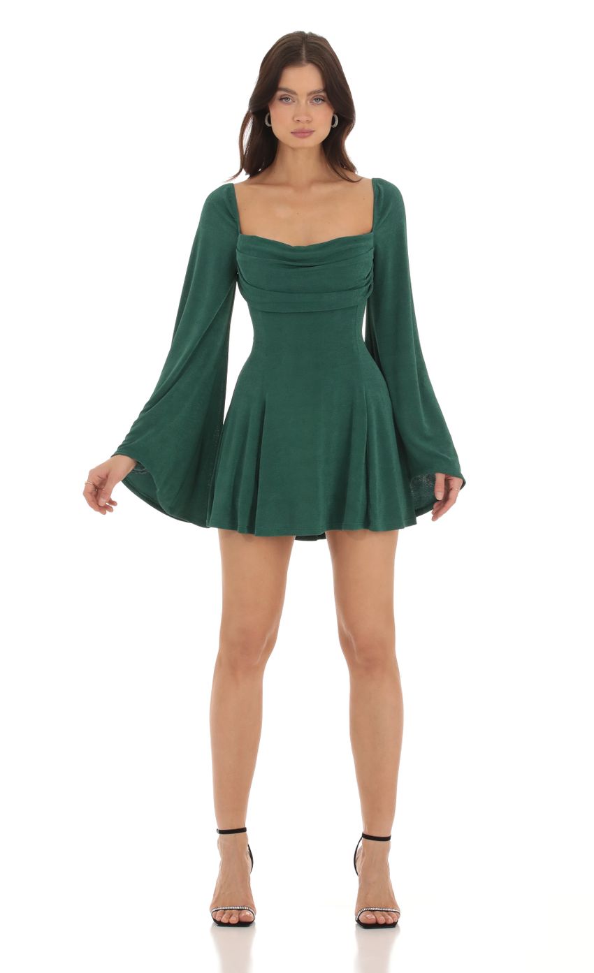 Picture Slinky Flare Sleeve Dress in Green. Source: https://media-img.lucyinthesky.com/data/Oct23/850xAUTO/303f611b-a52d-4578-84f8-8c7ebee7adeb.jpg