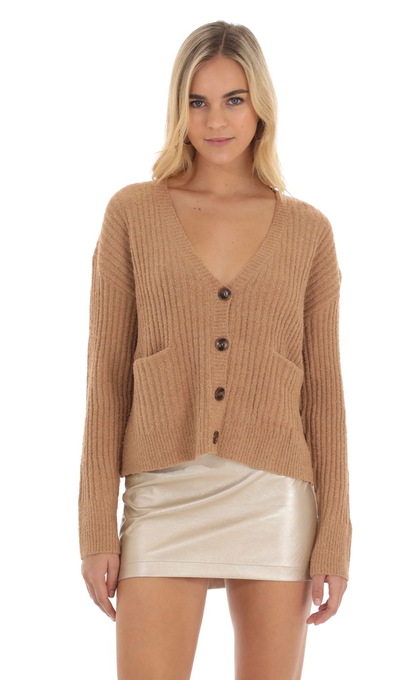 Picture Knit Cardigan in Brown. Source: https://media-img.lucyinthesky.com/data/Oct23/850xAUTO/42b3448d-d894-49e0-90ab-2d211581c1c3.jpg