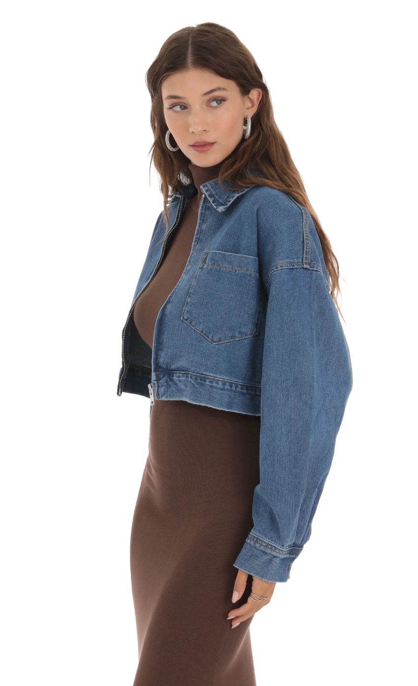 Picture Cropped Jean Jacket in Blue. Source: https://media-img.lucyinthesky.com/data/Oct23/850xAUTO/43de626e-483e-4961-9933-10eda4a0118e.jpg