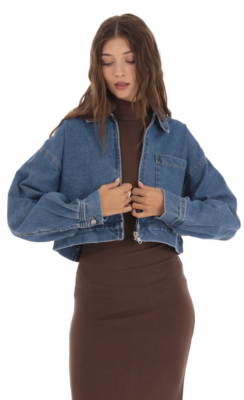 Picture Cropped Jean Jacket in Blue. Source: https://media-img.lucyinthesky.com/data/Oct23/850xAUTO/45f3d26f-530b-4358-ad2f-12ce3fa2b4c6.jpg