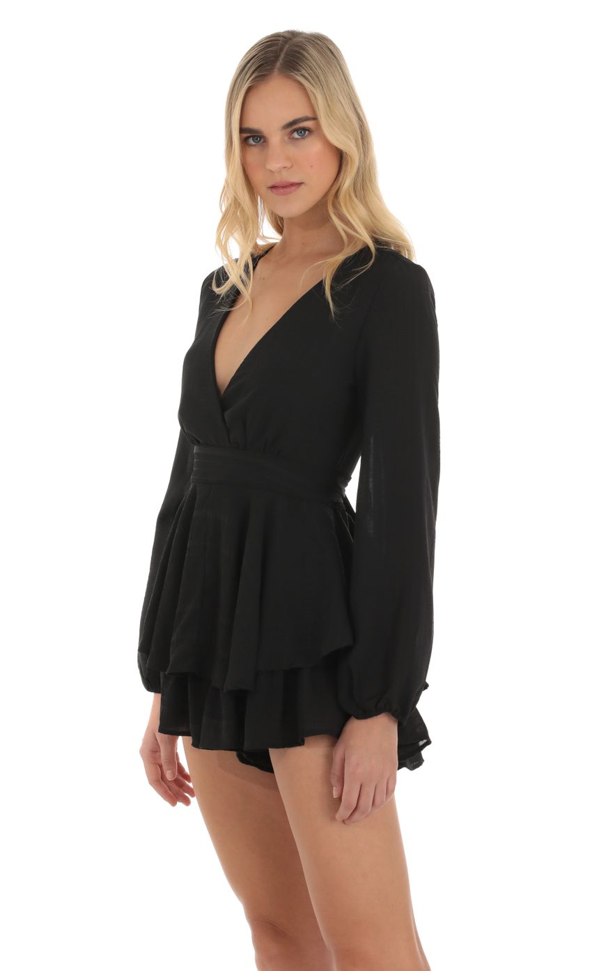 Picture Long Sleeve Wrap Romper in Black. Source: https://media-img.lucyinthesky.com/data/Oct23/850xAUTO/53ff7830-3d41-478d-9025-3c2ced41ca34.jpg