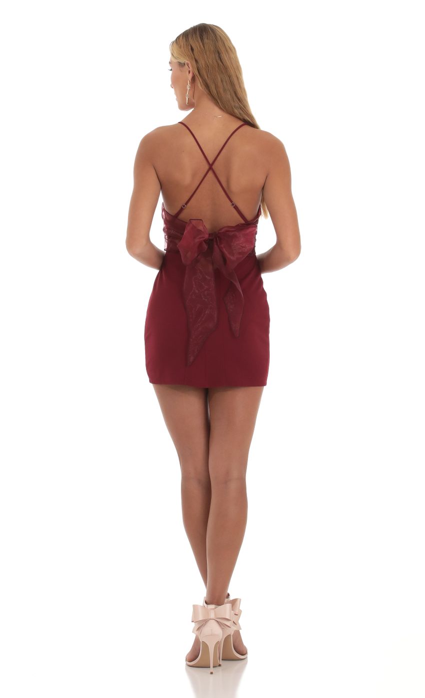 Picture Bow Tie Bodycon Dress in Maroon. Source: https://media-img.lucyinthesky.com/data/Oct23/850xAUTO/562f33a6-38e8-40ab-a876-a08401a34569.jpg