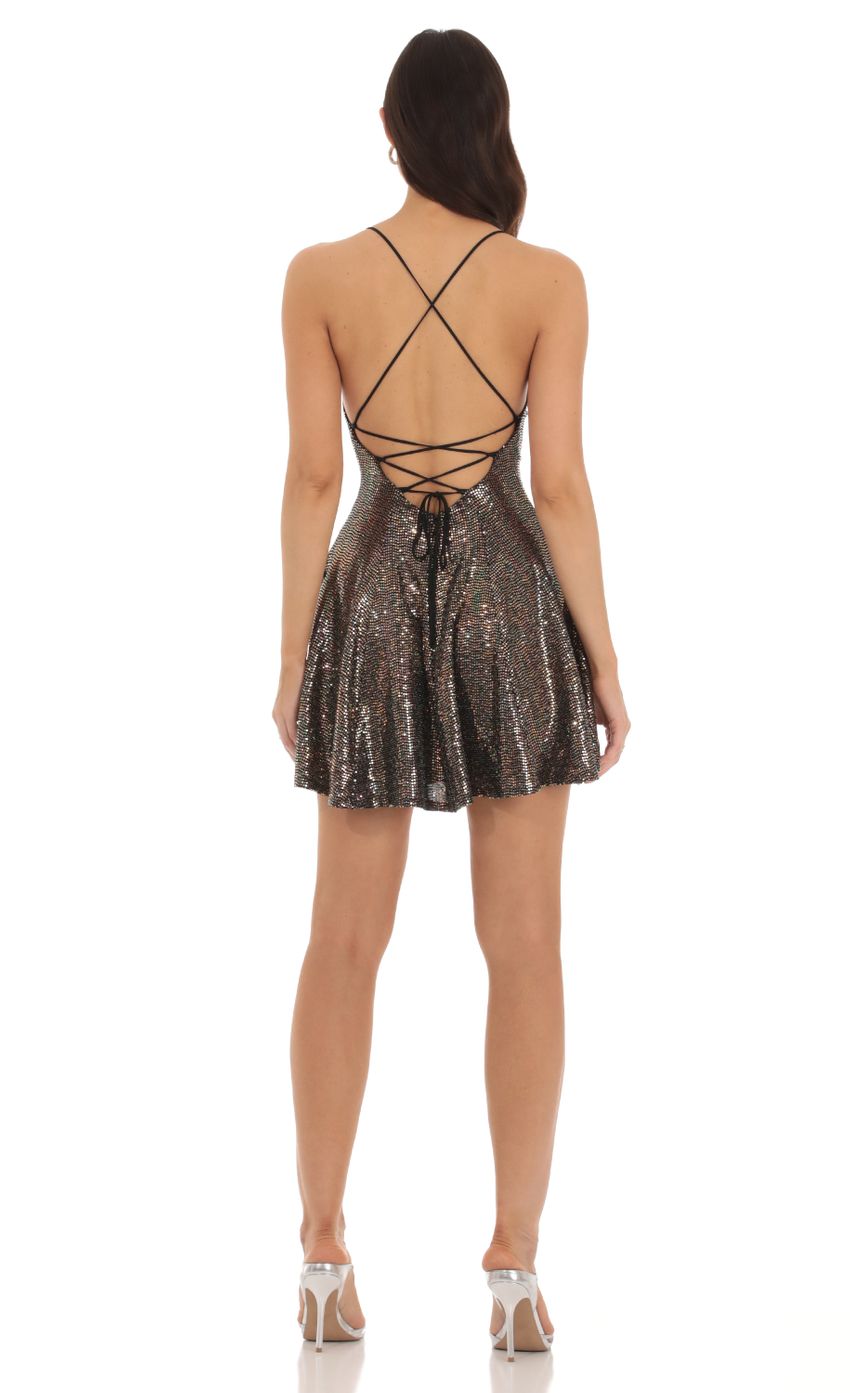 Picture Iridescent Sequin Flare Dress in Copper. Source: https://media-img.lucyinthesky.com/data/Oct23/850xAUTO/5f309b3c-f7b1-46cc-b961-4edc63ef41e4.jpg
