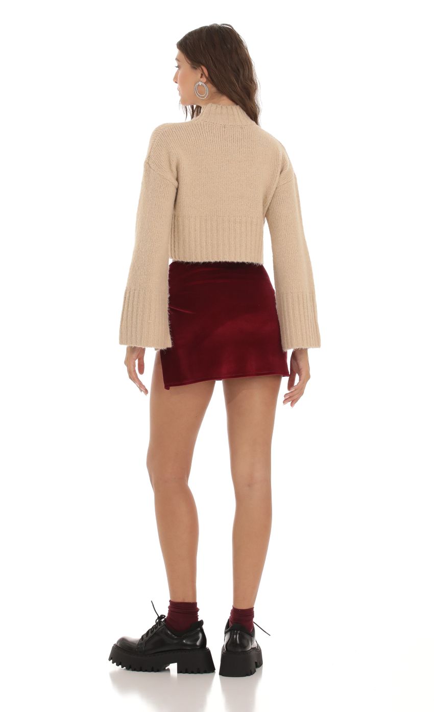 Picture Velvet High Slit Skirt in Burgundy. Source: https://media-img.lucyinthesky.com/data/Oct23/850xAUTO/6105158e-ebe8-454d-b059-251ba6b868bd.jpg