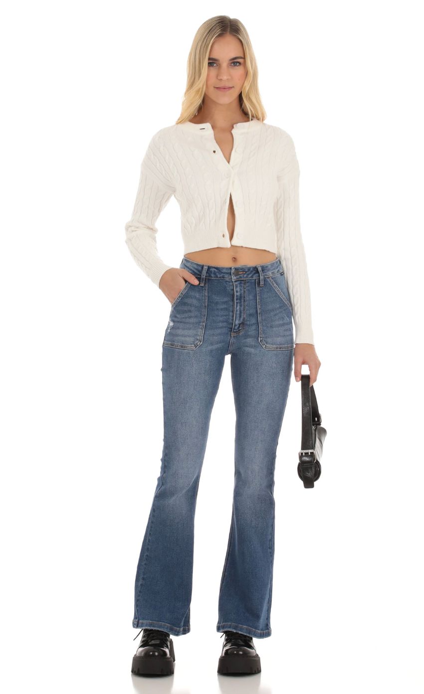 Picture Faded Flare Jeans in Denim. Source: https://media-img.lucyinthesky.com/data/Oct23/850xAUTO/74ce1489-a123-4d68-a900-c415e09c94dd.jpg