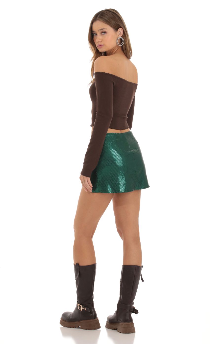 Picture Sequin Slit Skirt in Green. Source: https://media-img.lucyinthesky.com/data/Oct23/850xAUTO/7cdd56e7-f32a-4ac1-b62c-fcd7658fe2fd.jpg