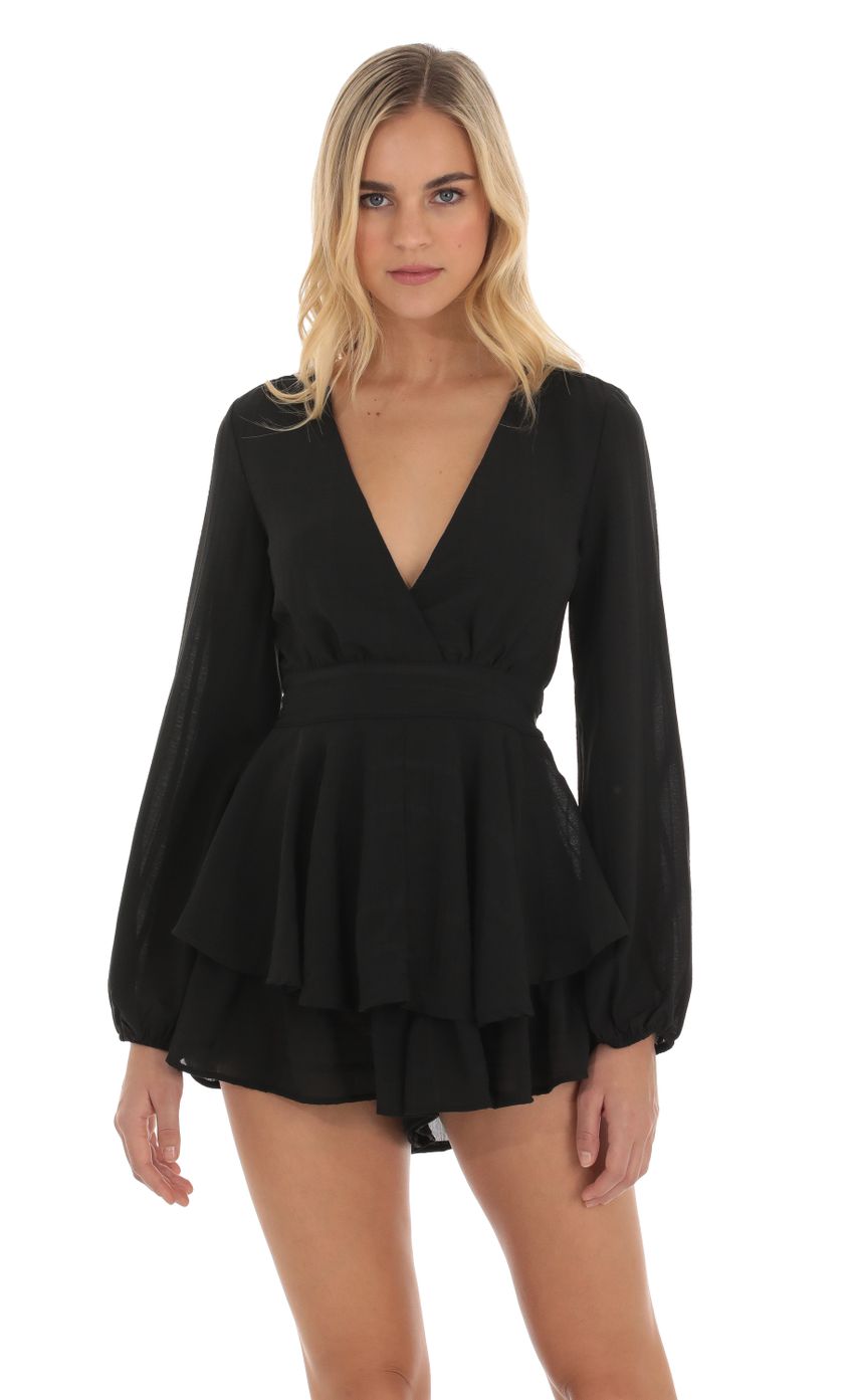 Picture Long Sleeve Wrap Romper in Black. Source: https://media-img.lucyinthesky.com/data/Oct23/850xAUTO/837d4192-0960-4721-bf0a-706f49f90338.jpg
