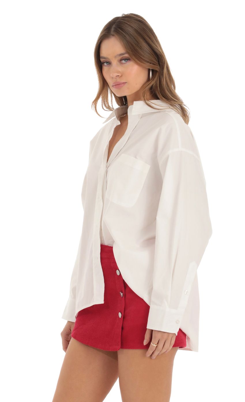 Picture Button Down Top in White. Source: https://media-img.lucyinthesky.com/data/Oct23/850xAUTO/8a4312bc-6531-4ea1-9e8e-5f55eee5a77f.jpg