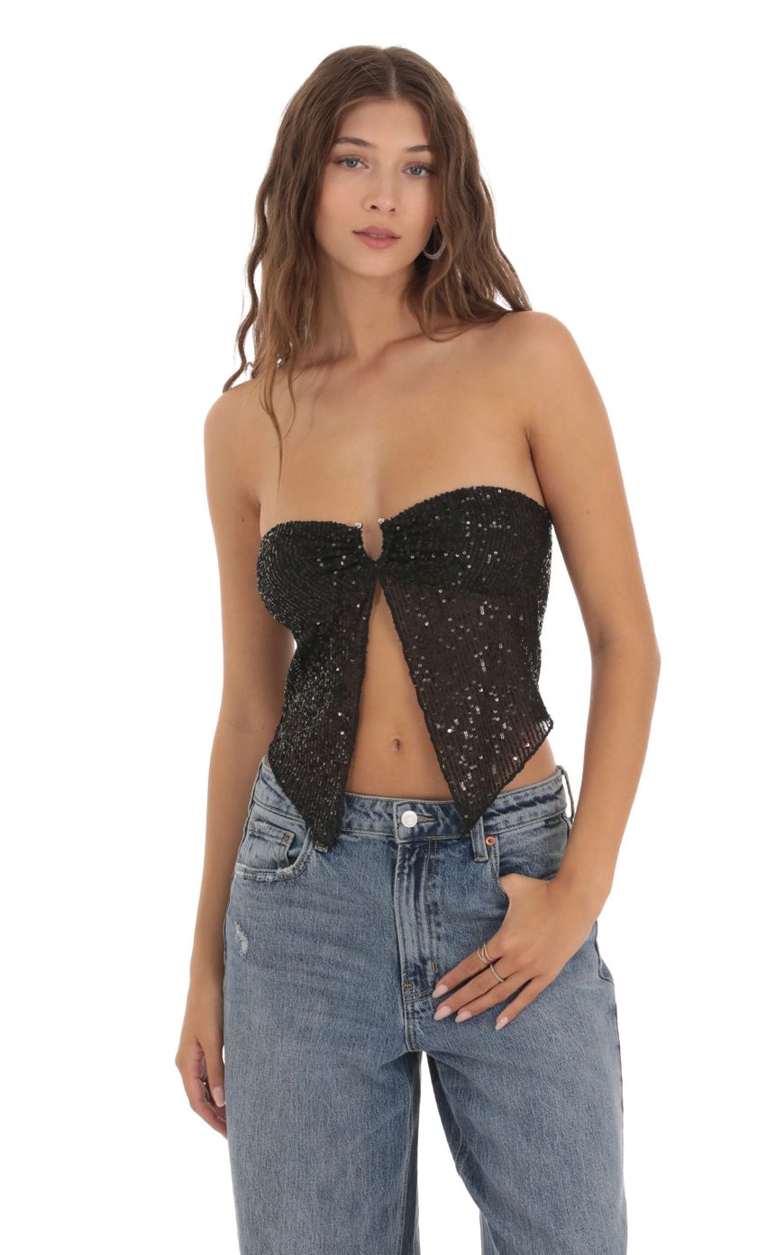 Picture Sequin Strapless Top in Black. Source: https://media-img.lucyinthesky.com/data/Oct23/850xAUTO/9352815a-d56b-4bac-b8bd-656627d36c48.jpg