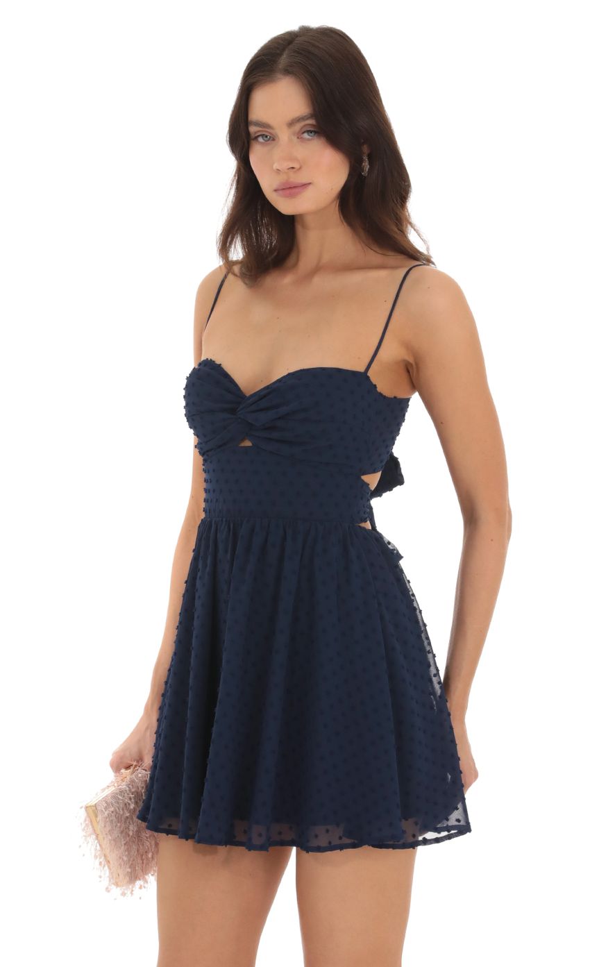 Picture Dotted Chiffon Twist Dress in Navy. Source: https://media-img.lucyinthesky.com/data/Oct23/850xAUTO/a1f3975e-9fcd-4099-801d-d7060915f79f.jpg
