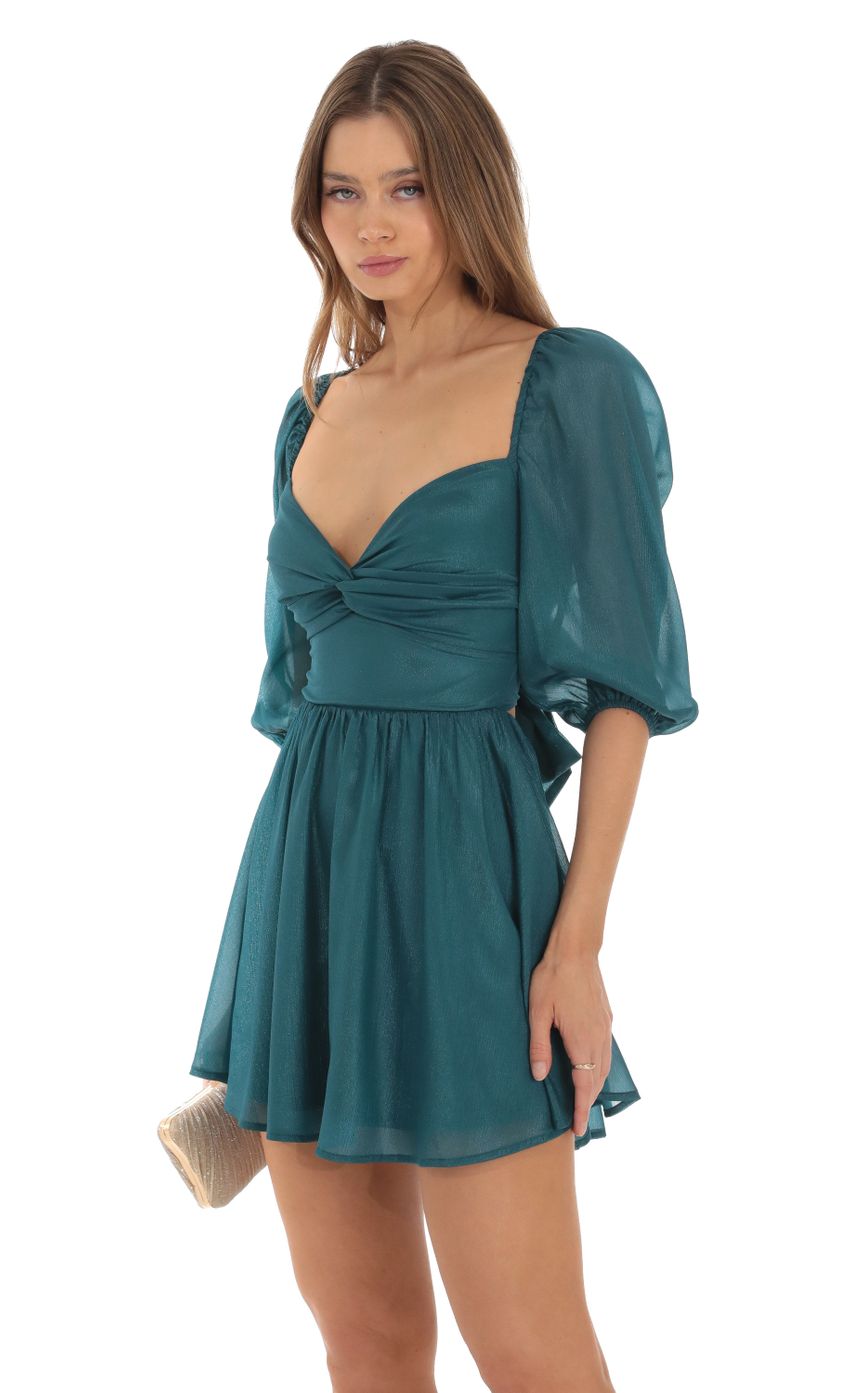 Picture Shimmer Chiffon Twist Dress in Teal. Source: https://media-img.lucyinthesky.com/data/Oct23/850xAUTO/a9e5cd53-1a31-409e-b431-2c5125872efc.jpg