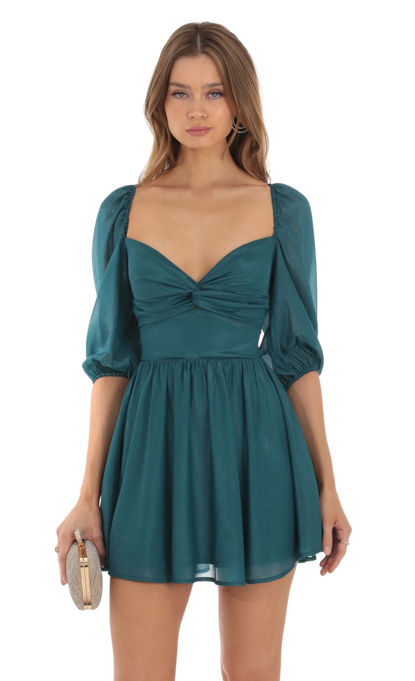 Picture Shimmer Chiffon Twist Dress in Teal. Source: https://media-img.lucyinthesky.com/data/Oct23/850xAUTO/b380d822-b1b8-4784-857b-2a2fdedb496a.jpg