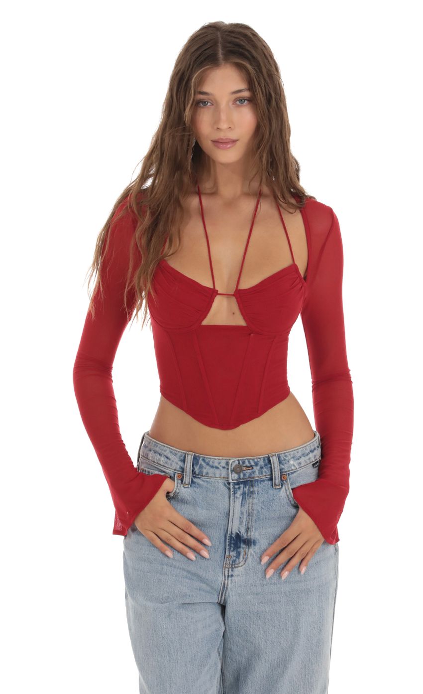 Picture Strappy Corset Top in Red. Source: https://media-img.lucyinthesky.com/data/Oct23/850xAUTO/b4abfb79-f17c-4b9f-a682-fb490a6cc06e.jpg