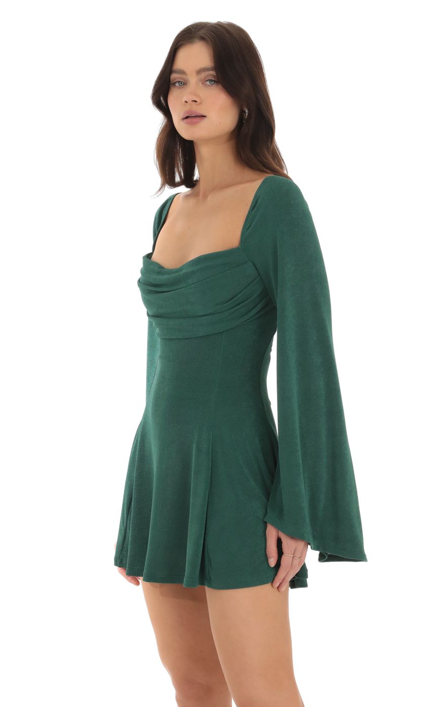 Picture Slinky Flare Sleeve Dress in Green. Source: https://media-img.lucyinthesky.com/data/Oct23/850xAUTO/b594317d-5b44-4505-a542-12f3539a6ae3.jpg