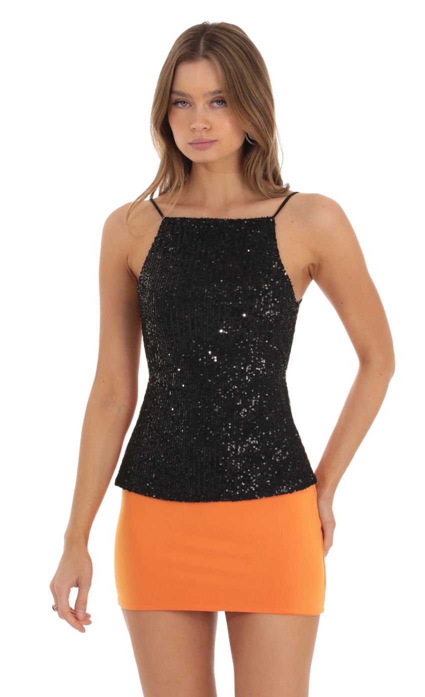 Picture Sequin Open Back Top in Black. Source: https://media-img.lucyinthesky.com/data/Oct23/850xAUTO/b935a360-b658-4b0d-91c2-134e06f07206.jpg