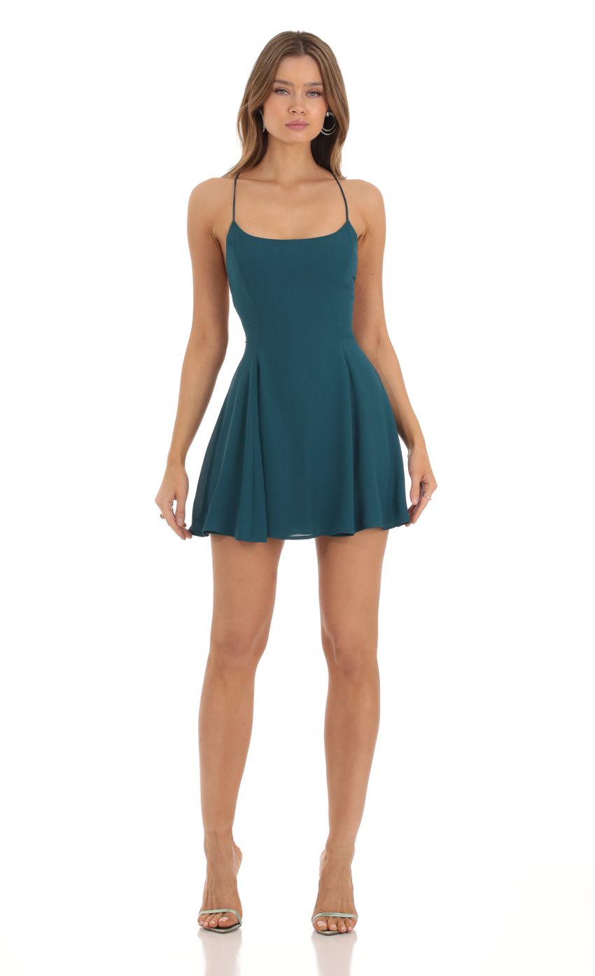 Picture Fit and Flare Dress in Teal. Source: https://media-img.lucyinthesky.com/data/Oct23/850xAUTO/c3979c35-c578-4818-bf8e-1e3c6ca507ca.jpg