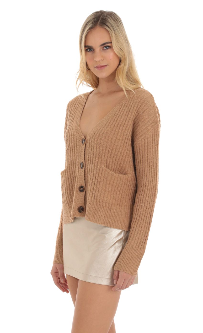 Picture Knit Cardigan in Brown. Source: https://media-img.lucyinthesky.com/data/Oct23/850xAUTO/c72d48b9-b43b-4ea1-b1b6-9a87dc106c8a.jpg