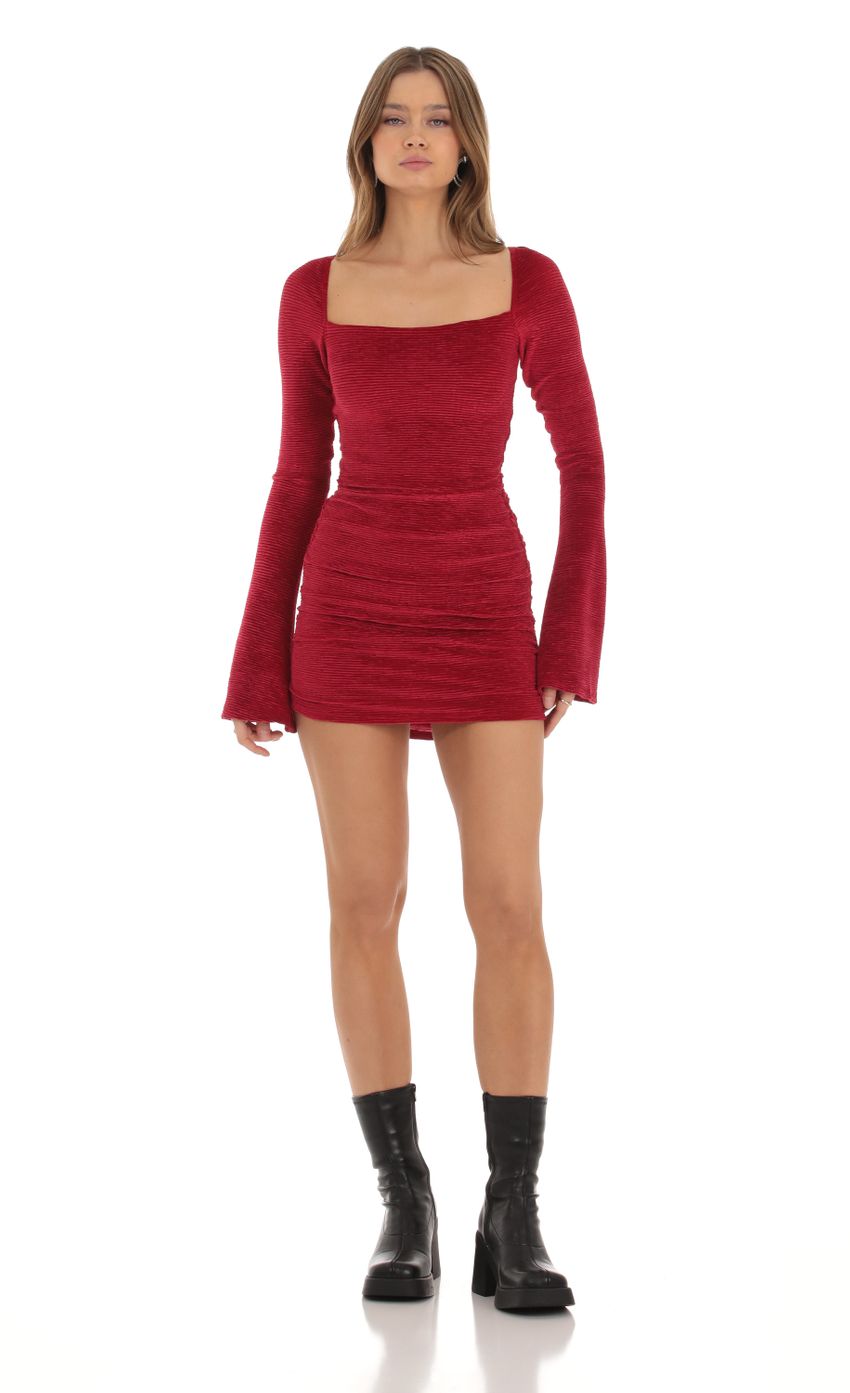 Picture Velvet Pleated Bell Sleeve Dress in Red. Source: https://media-img.lucyinthesky.com/data/Oct23/850xAUTO/c8edfa3f-01b2-4518-80c8-ad4537db4277.jpg