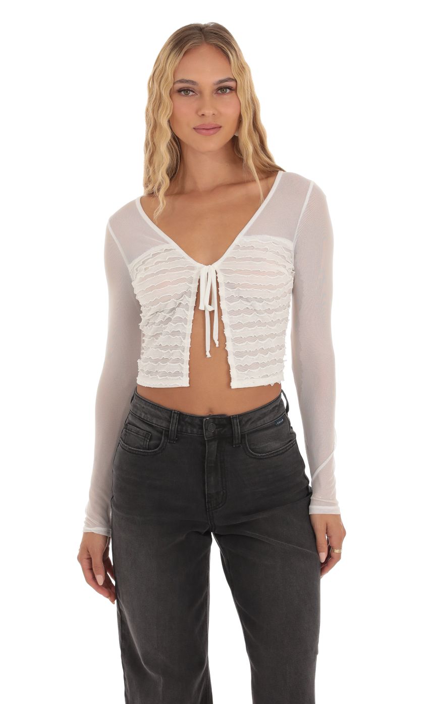 Picture Mesh Ruffle Top in White. Source: https://media-img.lucyinthesky.com/data/Oct23/850xAUTO/cf8522ec-9687-43af-9773-c168965c7dce.jpg