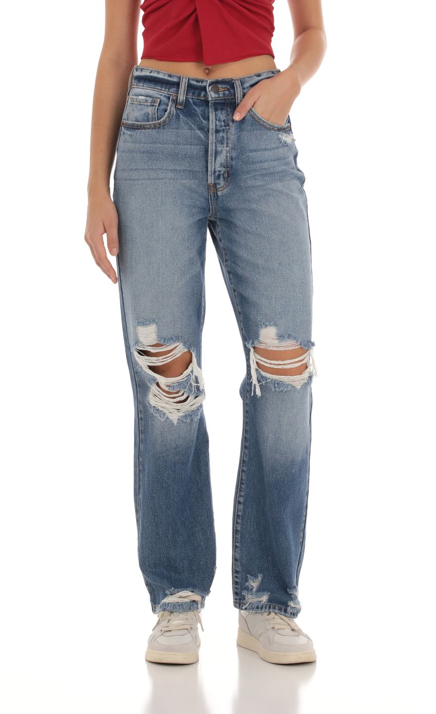 Picture Distressed Jeans in Faded Denim. Source: https://media-img.lucyinthesky.com/data/Oct23/850xAUTO/fbb53a8b-dc4e-4c18-ac00-a1e319658704.jpg