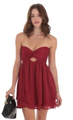 Picture Strapless Shimmer Cutout Babydoll Dress in Burgundy. Source: https://media-img.lucyinthesky.com/data/Oct24/150xAUTO/1be708ab-80b9-483a-80fb-a7be0dafbbe3.jpg