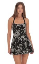 Picture Sequin Floral Embroidered Halter Open Back Dress in Black. Source: https://media-img.lucyinthesky.com/data/Oct24/150xAUTO/6ae08c32-40dd-4360-b879-a3ec7f0140c9.jpg