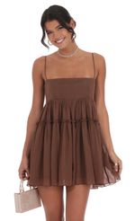 Picture Shimmer Babydoll Dress in Brown. Source: https://media-img.lucyinthesky.com/data/Oct24/150xAUTO/6c40a127-87b0-4d58-9831-a5a3f3528850.jpg