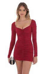 Picture Ruched Long Sleeve Bodycon Dress in Maroon. Source: https://media-img.lucyinthesky.com/data/Oct24/150xAUTO/9bef27db-7fef-4173-8b36-9727afbccd71.jpg