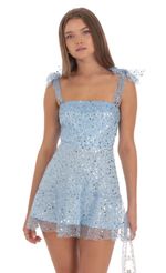 Picture Sequin Beaded A-line Dress in Sky Blue. Source: https://media-img.lucyinthesky.com/data/Oct24/150xAUTO/a32347b8-3cc9-421f-ae13-934684e87402.jpg