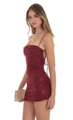 Picture Sequin Ruffle Mini Dress in Burgundy. Source: https://media-img.lucyinthesky.com/data/Oct24/150xAUTO/b88847b9-c1e5-447f-9ca3-35f21e69bc13.jpg