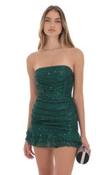 Picture Sequin Ruched Bodycon Dress in Green. Source: https://media-img.lucyinthesky.com/data/Oct24/150xAUTO/b9790c4e-e14b-40ee-b923-4e4c07fe451a.jpg