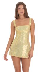 Picture Sequin GLitter Back Bow Bodycon Dress in Yellow. Source: https://media-img.lucyinthesky.com/data/Oct24/150xAUTO/b990200f-c974-4a39-a098-7c6a02cbaa82.jpg