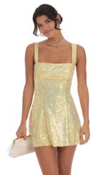 Picture Sequin Glitter Back Bow Bodycon Dress in Yellow. Source: https://media-img.lucyinthesky.com/data/Oct24/150xAUTO/ef2ad9d8-0aa2-4bd8-9991-ce3ca0bdce96.jpg