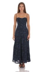 Picture Textured Floral Maxi Dress in Navy. Source: https://media-img.lucyinthesky.com/data/Oct24/150xAUTO/fa666f6c-395b-4bff-b60f-ea8f939f9f4a.jpg