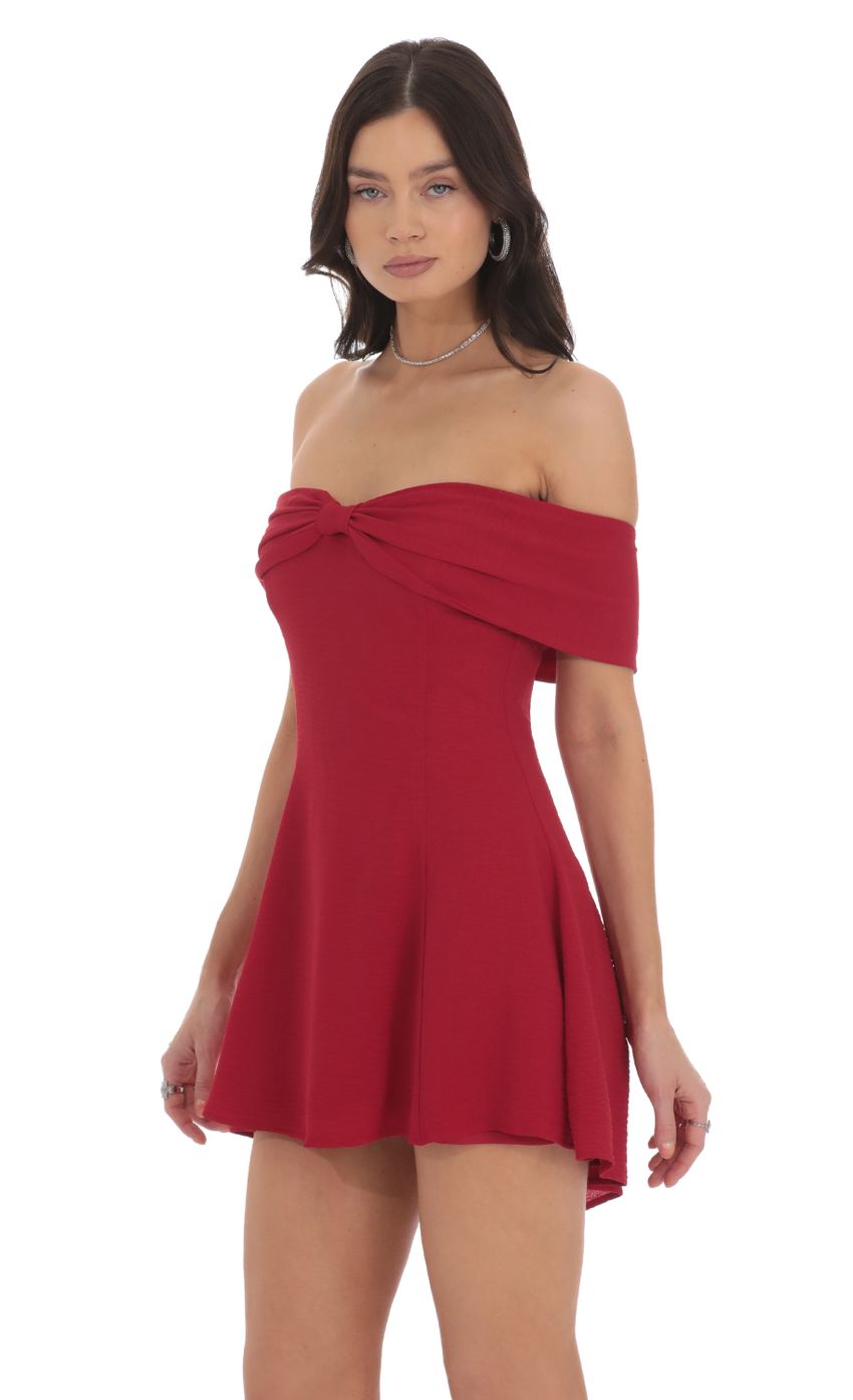 Picture Front Bow Off Shoulder Dress in Red. Source: https://media-img.lucyinthesky.com/data/Oct24/850xAUTO/0c59191c-6087-4b94-b62a-a7247b6d65c0.jpg