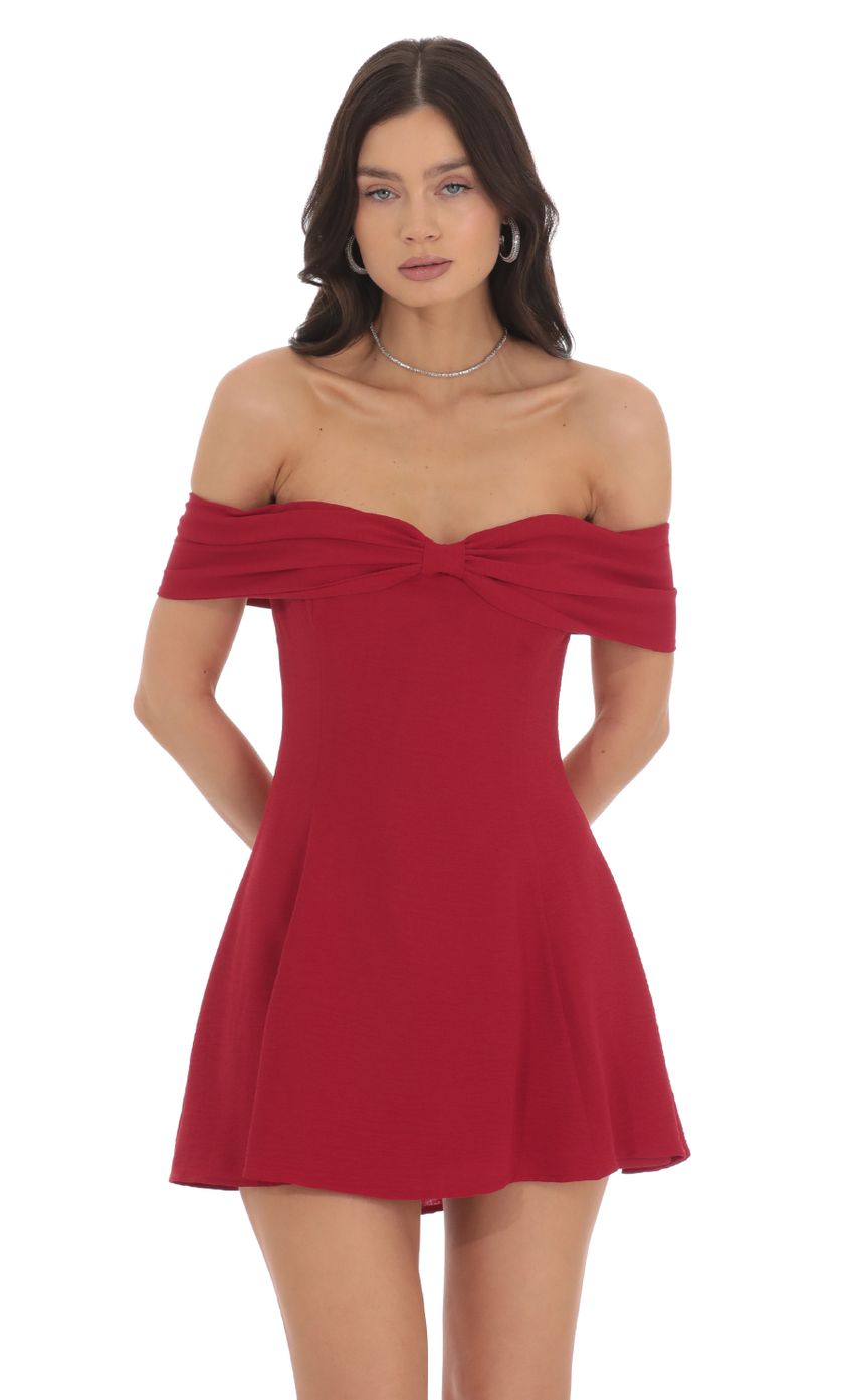 Picture Front Bow Off Shoulder Dress in Red. Source: https://media-img.lucyinthesky.com/data/Oct24/850xAUTO/0f4248a5-826e-4b19-b63c-b84d5e4b8f84.jpg