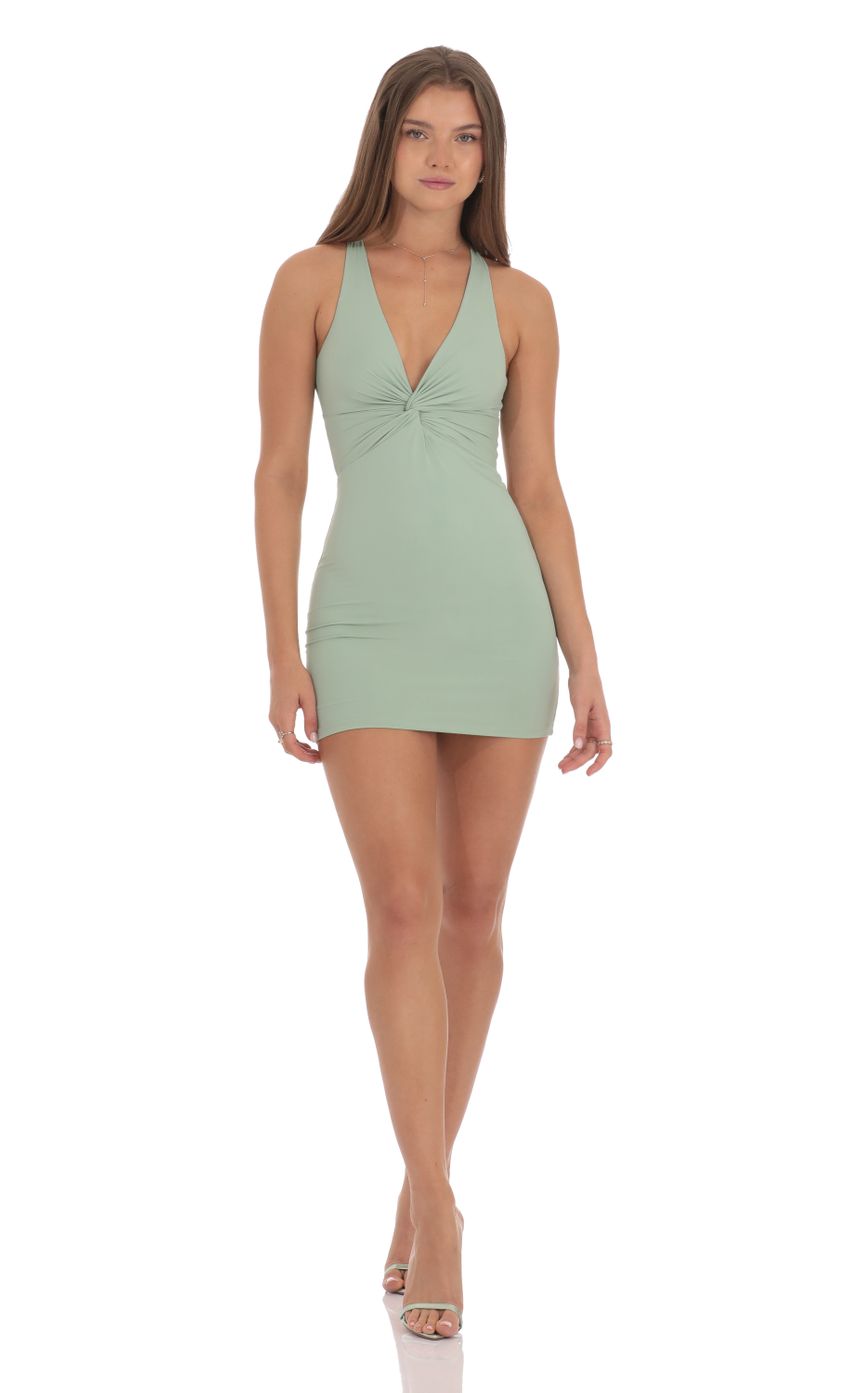 Picture Twist Open Back Dress in Sage Green. Source: https://media-img.lucyinthesky.com/data/Oct24/850xAUTO/15e9c96b-5fbb-48bf-8f7a-07d2de12c880.jpg