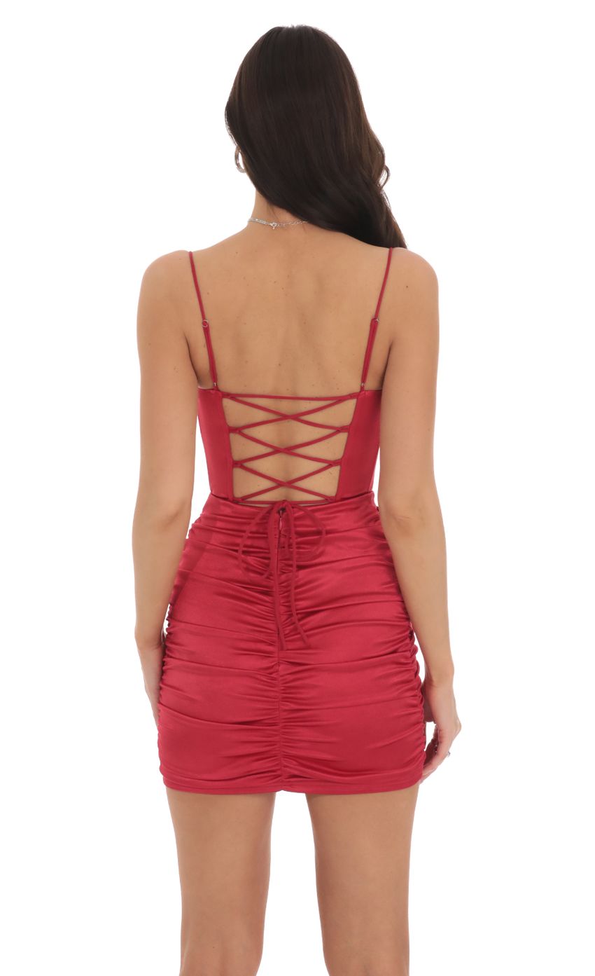 Picture Satin Draped Corset Dress in Red. Source: https://media-img.lucyinthesky.com/data/Oct24/850xAUTO/421db87c-d63f-4b46-b5c3-1c7bd95a682b.jpg