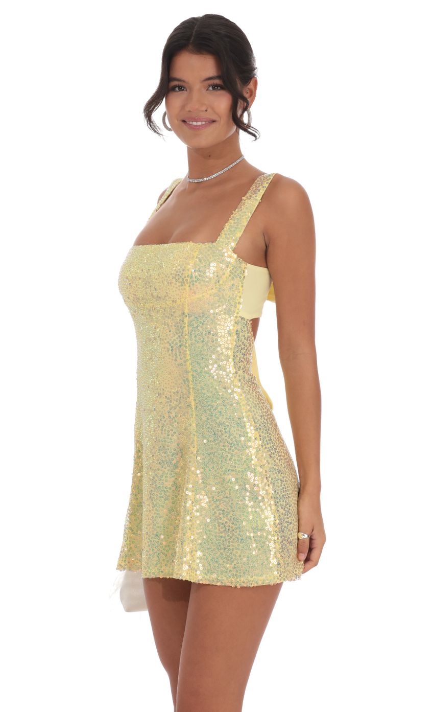 Picture Sequin GLitter Back Bow Bodycon Dress in Yellow. Source: https://media-img.lucyinthesky.com/data/Oct24/850xAUTO/5ea93670-89b4-41a8-9eef-d6de1820f626.jpg