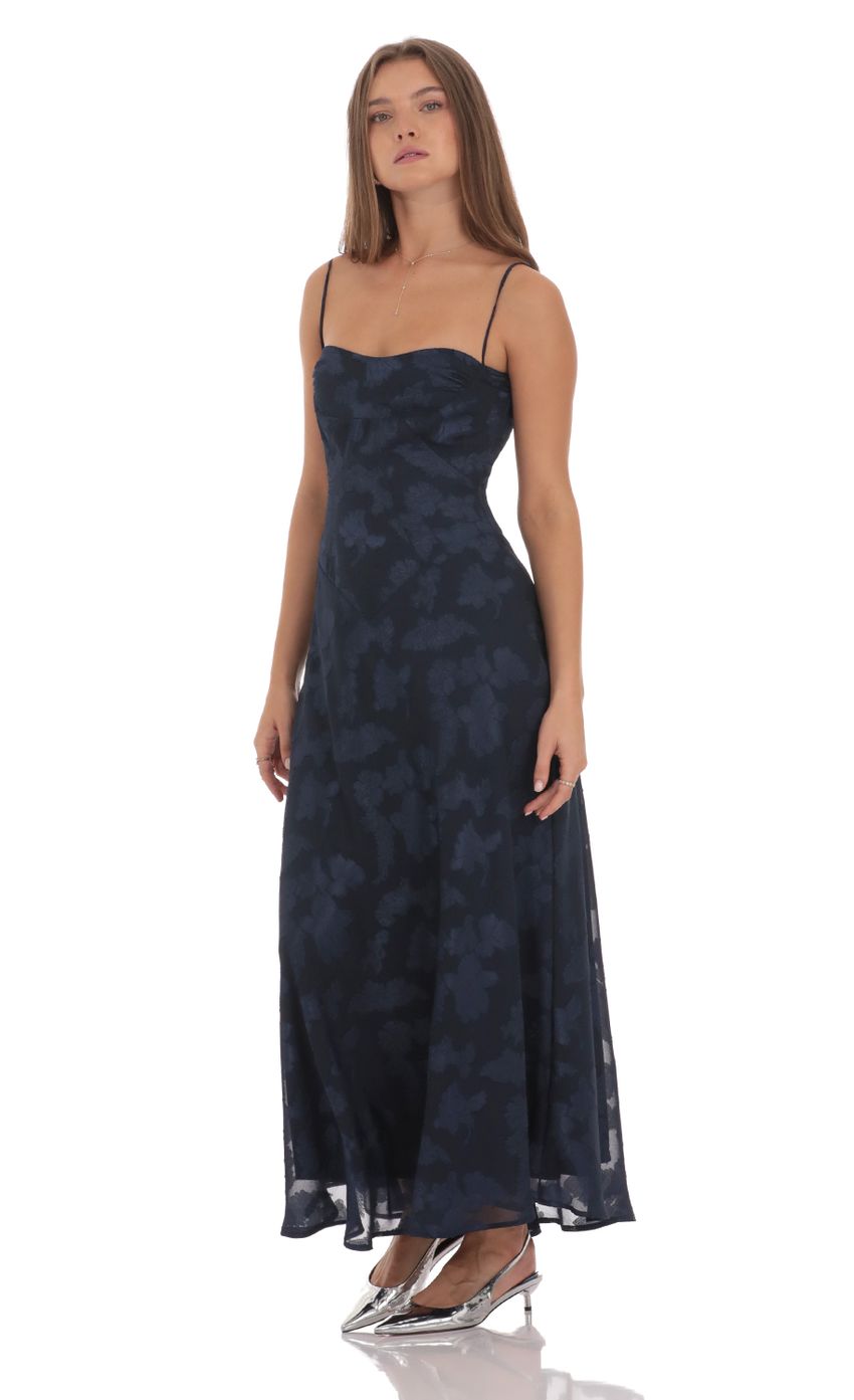 Picture Textured Floral Maxi Dress in Navy. Source: https://media-img.lucyinthesky.com/data/Oct24/850xAUTO/68deaed2-9235-4759-a3fe-7f3515614181.jpg