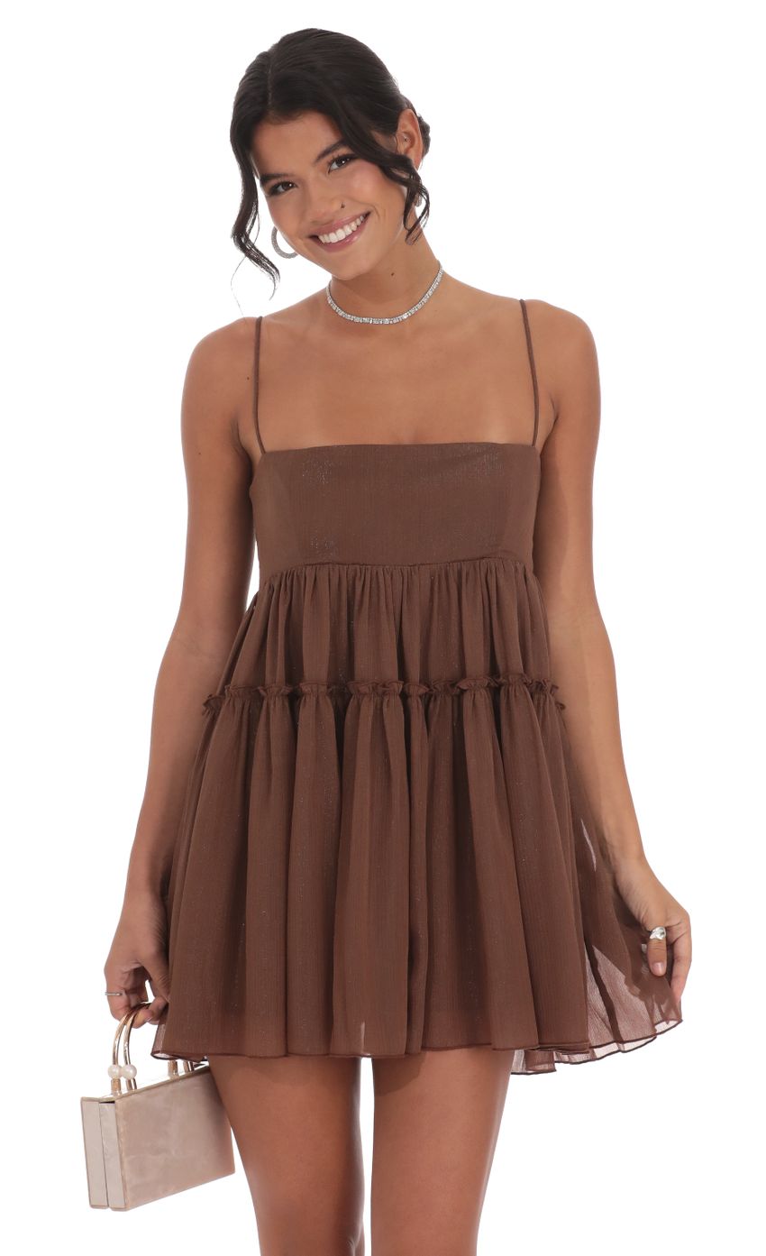 Picture Shimmer Babydoll Dress in Brown. Source: https://media-img.lucyinthesky.com/data/Oct24/850xAUTO/6c40a127-87b0-4d58-9831-a5a3f3528850.jpg