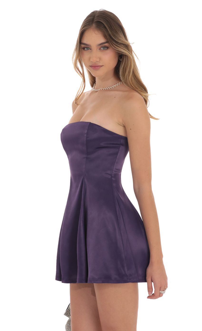 Picture Strapless Satin Fit and Flare Dress in Purple. Source: https://media-img.lucyinthesky.com/data/Oct24/850xAUTO/7c105813-4917-4dc7-aaee-eac9d11bbf03.jpg