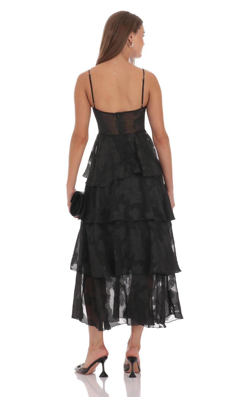 Picture Floral Ruffle A-line Maxi Dress in Black. Source: https://media-img.lucyinthesky.com/data/Oct24/850xAUTO/818dbcca-f723-4963-a0f5-9b6c51b755a6.jpg