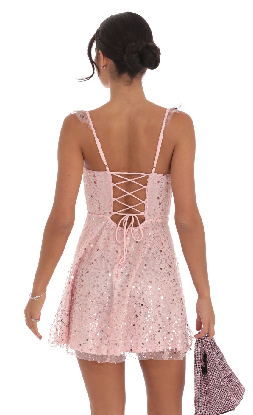 Picture Sequin Ruffle Strap A-Line Dress in Pink. Source: https://media-img.lucyinthesky.com/data/Oct24/850xAUTO/a09e3220-4be3-4fba-abe0-eca5919c6c3a.jpg