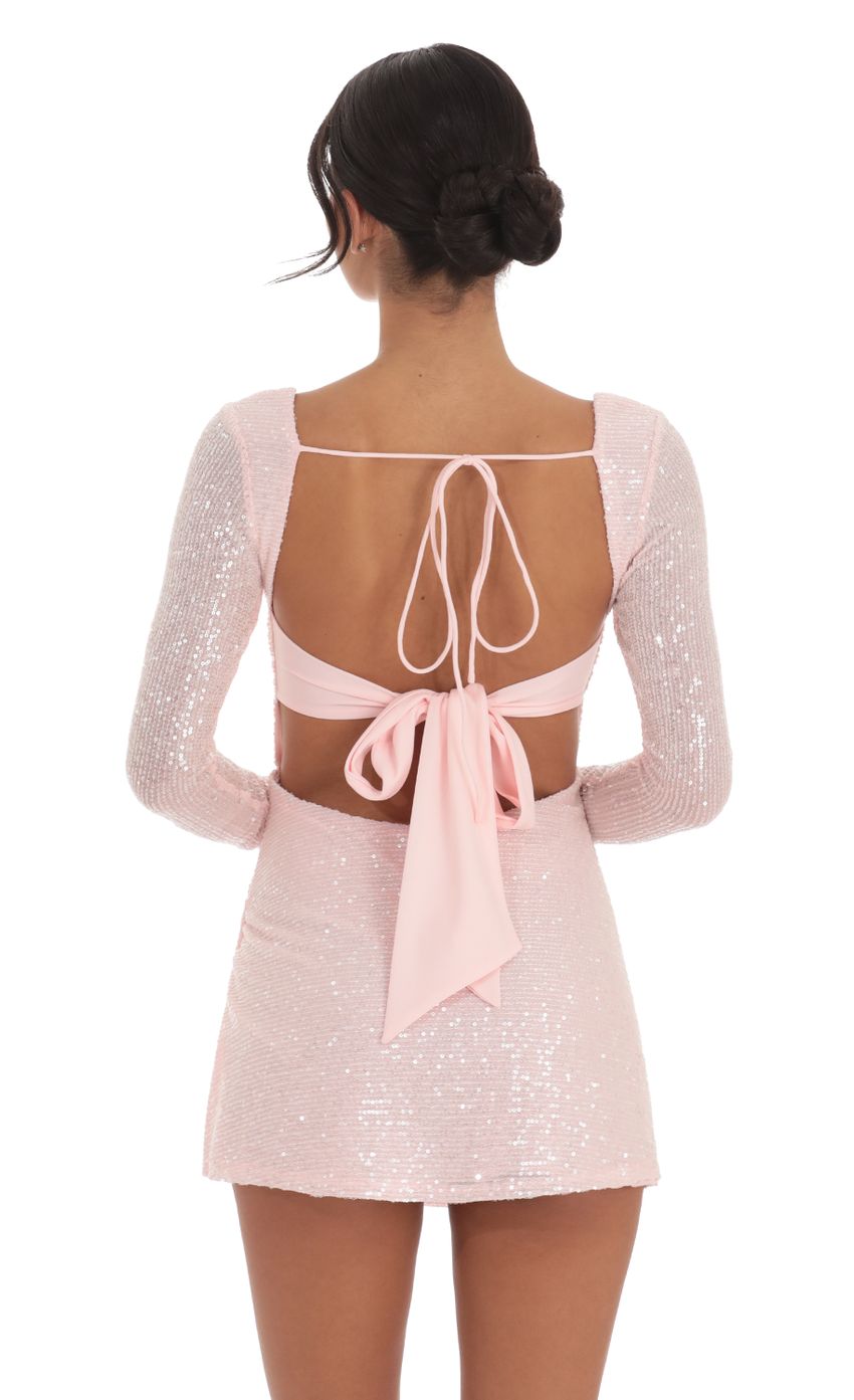 Picture Sequin Long Sleeve Side Slit Dress in Light Pink. Source: https://media-img.lucyinthesky.com/data/Oct24/850xAUTO/d8a5c203-5af1-41ee-ad8e-c890d88fe55a.jpg