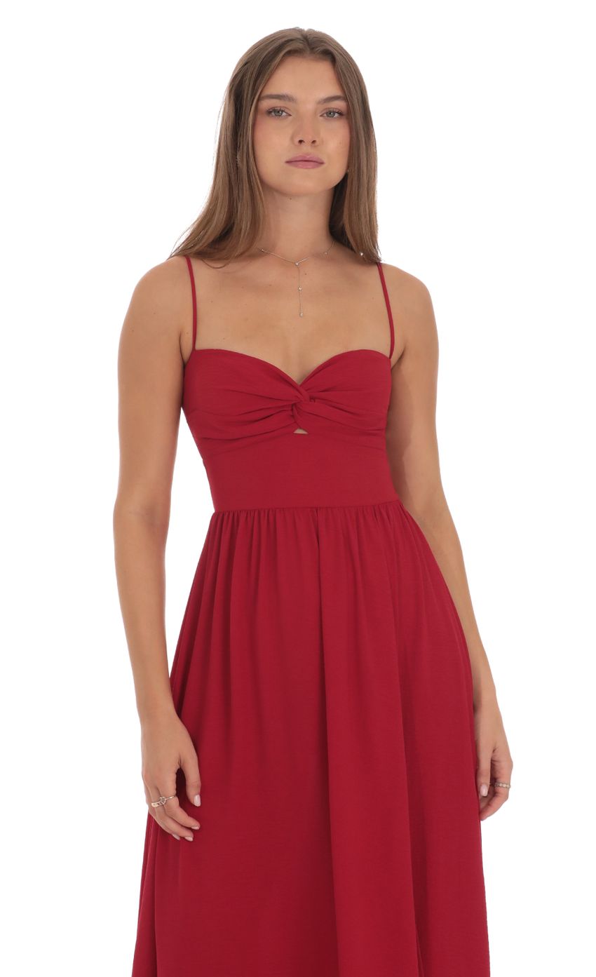 Picture Front Twist Midi Dress in Red. Source: https://media-img.lucyinthesky.com/data/Oct24/850xAUTO/db0561a6-e684-4822-9d4a-c6763f44af9c.jpg