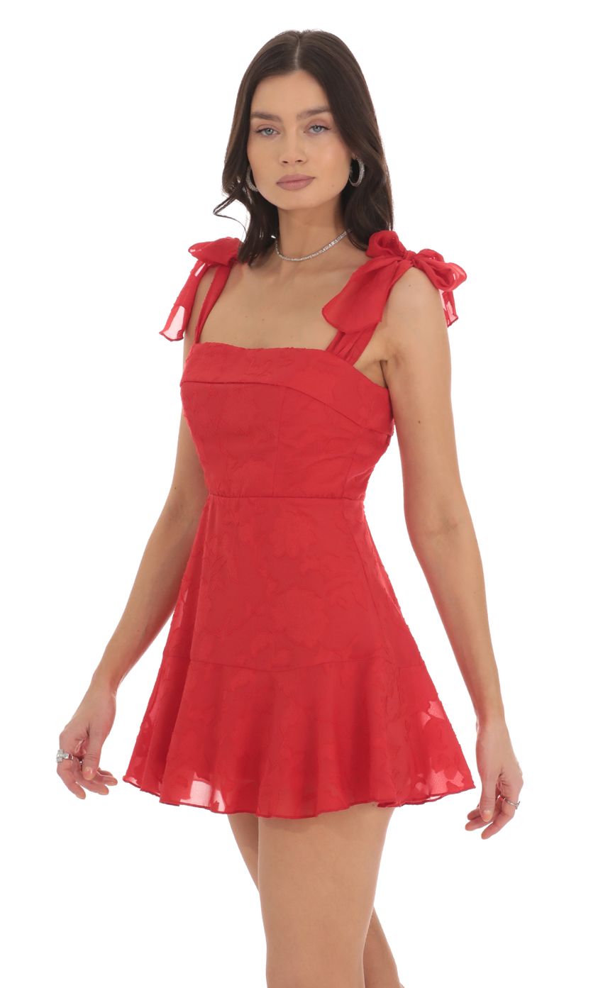 Picture Textured Floral A-line Dress in Red. Source: https://media-img.lucyinthesky.com/data/Oct24/850xAUTO/dfff01a6-f77d-4def-b592-78b554df52a3.jpg