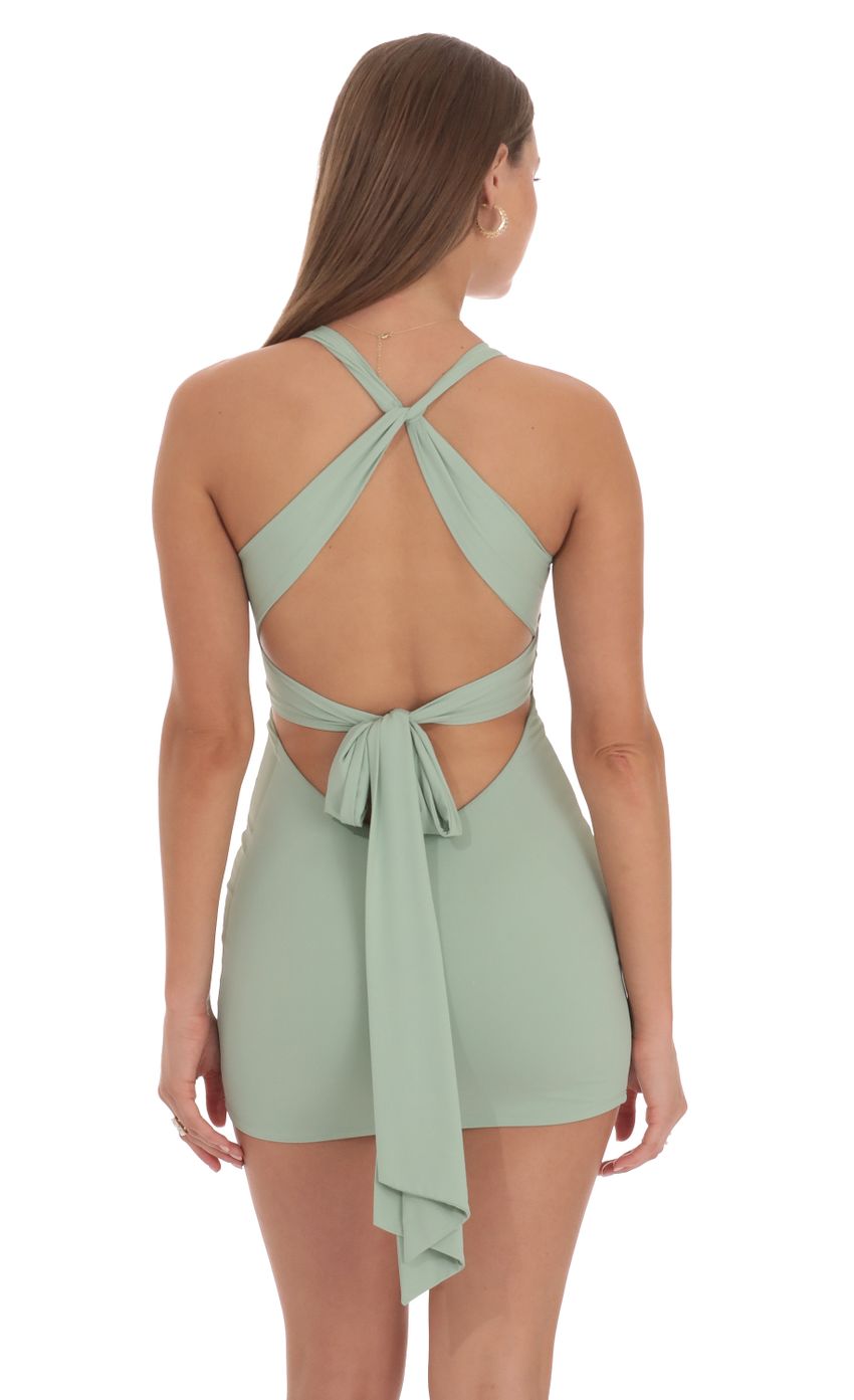 Picture Twist Open Back Dress in Sage Green. Source: https://media-img.lucyinthesky.com/data/Oct24/850xAUTO/ea92cc9e-64b8-477b-a2f3-bb93161b41d9.jpg