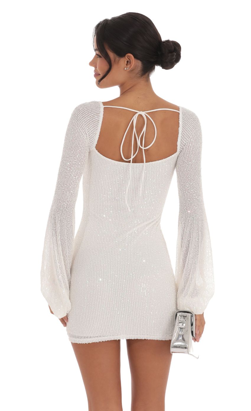 Picture Sequin Balloon Sleeve Dress in White. Source: https://media-img.lucyinthesky.com/data/Oct24/850xAUTO/ed28a3a4-12ad-4f8c-8cd8-764c4cea6242.jpg