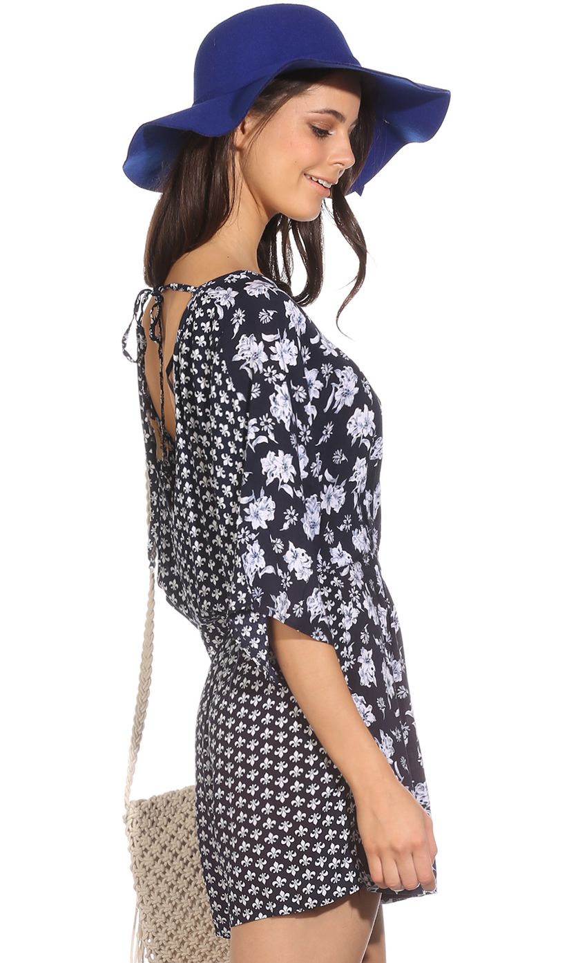 Picture FANCY FLORALS PLAYSUIT. Source: https://media-img.lucyinthesky.com/data/Sep14_2/850xAUTO/0Y5A9550_MAIN.JPG